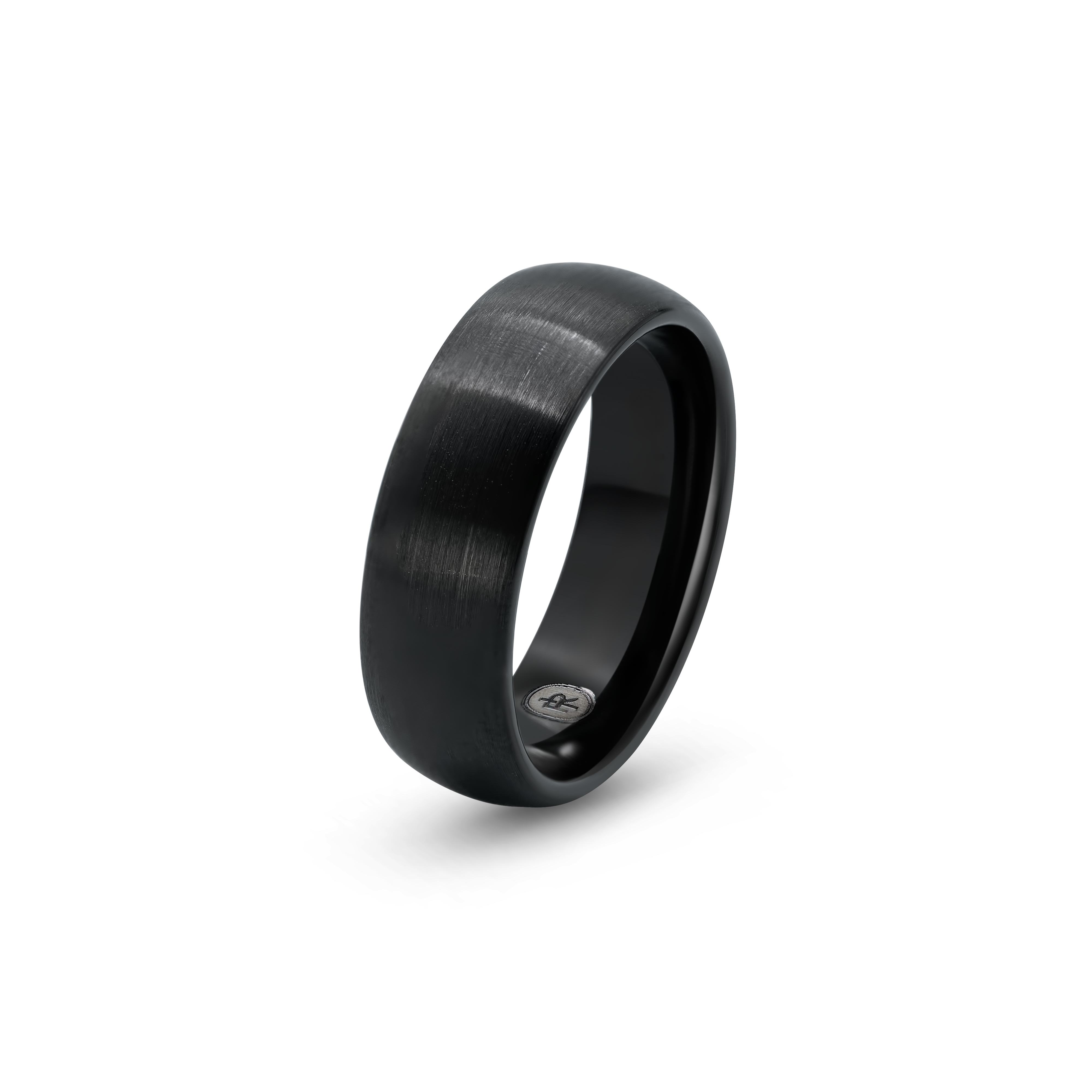 "The Nightshade" black tungsten ring with a brushed finish, photographed from the side showing the Iconic Rings engraved logo