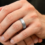 Macro close-up of The Gentleman brushed silver tungsten ring showing its finish and comfort-fit profile